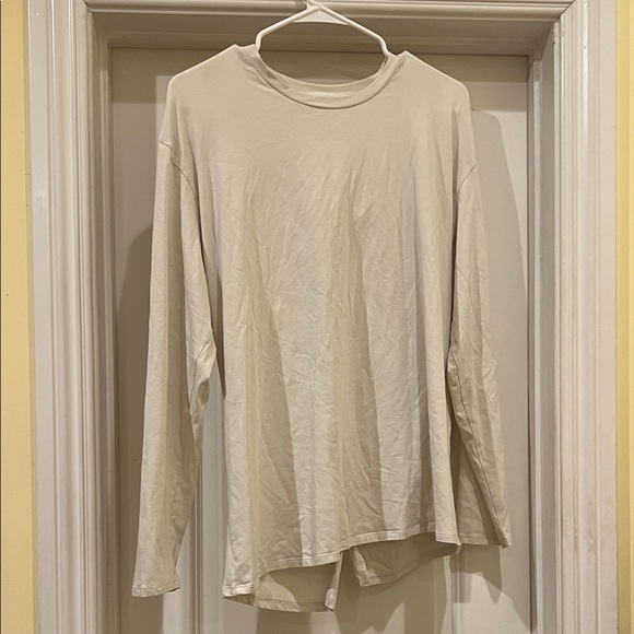 lululemon athletica Tops - Lululemon Cream Long Sleeve Twist Back Shirt